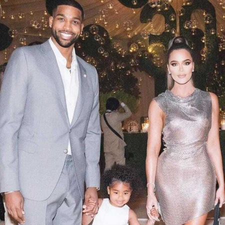 Tristan And Khloé with daughter True at an event